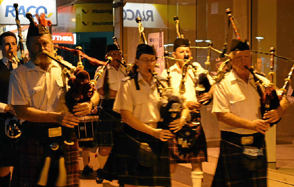 Warwick Thistle Pipe Band leads the march from the Town Hall to Leslie Park for the candle-lighting ceremony. Warwick Thistle Pipe Band leads the march from the Town Hall to Leslie Park for the candle-lighting ceremony.